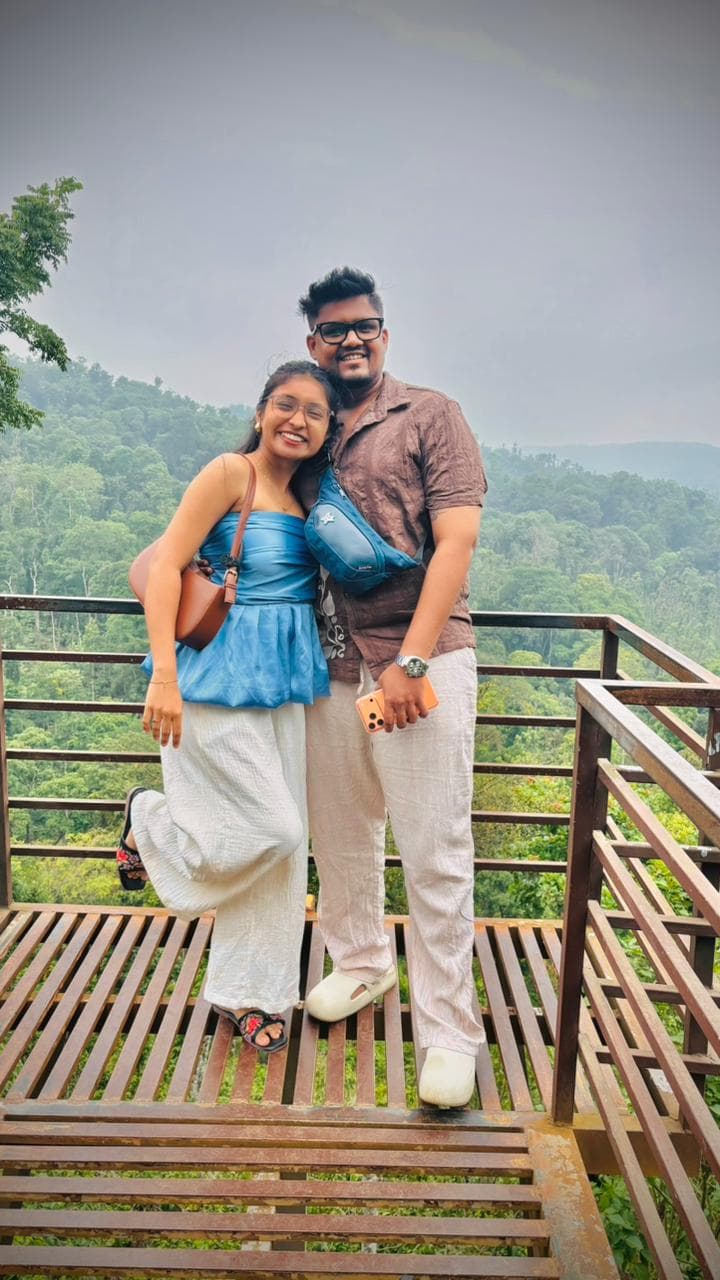 Couple at forest viewpoint